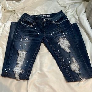 Ripped paint splatter jeans
